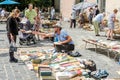 Lviv, Ukraine - July 2015: Men and women choose and buy, and sellers are selling old rare books and vintage items in the book mark Royalty Free Stock Photo