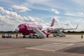 Plane Wizz Air at airport while refueling