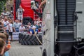 LVIV, UKRAINE - JULY 2016: Strong athlete strongman pulling a rope truck sitting with a partner is not huge tires Royalty Free Stock Photo