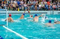 Lviv, Ukraine - July 2015: Ukrainian Cup water polo. Athlete team's water polo ball in a swimming pool and makes attacking shot on Royalty Free Stock Photo