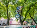 Lviv, Ukraine - July 2015: Yarych street Fest 2015. Extreme jumping on a BMX bike and perform stunts in the air Royalty Free Stock Photo