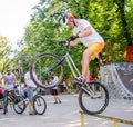 Lviv, Ukraine - July 2015: Yarych street Fest 2015. Extreme jumping on a BMX bike and perform stunts in the air Royalty Free Stock Photo