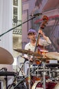 Lviv Ukraine June 2015: Alfa Jazz Fest 2015. Musician Contrast Trio band playing bass on stage jazz festival on the Market Squar Royalty Free Stock Photo