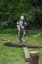 LVIV, UKRAINE - JUNE 2018: A cyclist performs tricks on a bicycle trial to overcome an obstacle course Royalty Free Stock Photo