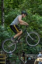 LVIV, UKRAINE - JUNE 2018: A cyclist performs tricks on a bicycle trial to overcome an obstacle course Royalty Free Stock Photo