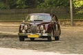 Old retro car Jaguar MK 3 taking participation in race