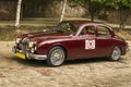 Old retro car Jaguar MK 3 taking participation in race