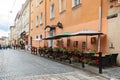 Outdoor cafe in Lviv, Ulraine. Centaur sculpture on building