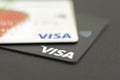 Visa contactless payment cards closeup. Black and white credit cards Visa close up. Selective focus