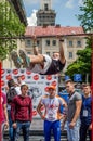 LVIV, UKRAINE - JUNE 2016: Young boy athlete demonstrates his ability by performing different exercises and figures on the horizon Royalty Free Stock Photo