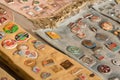 Lviv, Ukraine - 16.01.2022 : many of vintage ussr badges on flea market or thrift shop. Collectibles memorabilia and