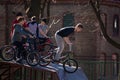 Lviv, Ukraine - March 12, 2020: BMX in the city skatepark. A group of teens on Bmx bikes in a skate park. Extreme sports Royalty Free Stock Photo