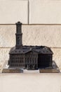 LVIV, UKRAINE - March 1, 2018. Bronze mini-layout of the Town Hall of Lviv.