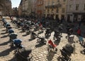 Lviv, Ukraine - March 18, 2022: 109 empty strollers are seen placed outside the Lviv city council during an action to highlight