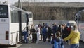 Lviv, Ukraine - March 15, 2022: Evacuation bus for refugees, escorted by pro-Russian rebels, which moves between