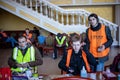 LVIV, UKRAINE -March 14, 2022: Humanitarian crisis during the war in Ukraine. Volunteers have a rest in the volunteer center at