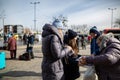 LVIV, UKRAINE - March 12, 2022: Humanitarian crisis during the war in Ukraine. Volunteers helping to feed thousands of refugees