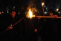 Members of the nationalist organizations hold torches as they take part in a rally marking the 70th death anniversary of Roman Shu