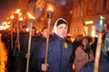 Members of the nationalist organizations hold torches as they take part in a rally marking the 70th death anniversary of Roman Shu