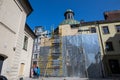 LVIV, UKRAINE - March 20, 2022: Protective structures base on scaffolding for protection facade of The Boim Chapel in case of