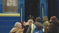 Lviv, Ukraine - March 15, 2022: Train with refugees, escorted by pro-Russian rebels, which moves between different