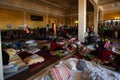 Ukrainian refugees on Lviv railway station during russian war. Refugee kids in waiting hall