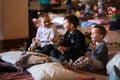 Ukrainian refugees on Lviv railway station during russian war. Refugee kids in waiting hall