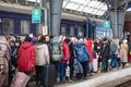 Ukrainian refugees on Lviv railway station waiting for train to escape to Europe