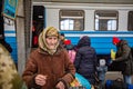 refugees on Lviv railway station waiting for train to escape to Europe during russian war