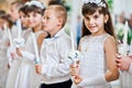 LVIV, UKRAINE - MAY 8, 2016: The ceremony of a First Communion i