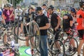 LVIV, UKRAINE - MAY 2018: The cyclist repairs his bicycle by pumping a punctured wheel Royalty Free Stock Photo