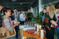 Different passengers take part in free alcohol degustation in Lviv international airport