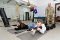 An instructor teaches children to use weapons at the military patriotic center for school children in Lviv, Ukraine
