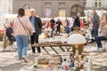 Lviv, Ukraine - May 1, 2022 : people bying different antiques on flea market Vernisazh in Lviv