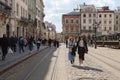 Peple walking on Market (Rynok) Square in Lviv Ukraine