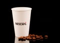 LVIV, UKRAINE - November 26, 2020: Nescafe coffee in a paper cup Royalty Free Stock Photo