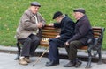 LVIV, UKRAINE - NOVEMBER 15, 2015: old men are playing chess in park of Lviv, Ukraine Royalty Free Stock Photo