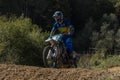 LVIV, UKRAINE - OCTOBER 2021: Athletes motorcycle children racers compete in motocross competition on the race track