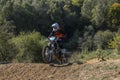 LVIV, UKRAINE - OCTOBER 2021: Athletes motorcycle racers compete in motocross competition on the race track