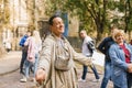 Lviv, Ukraine. Guides in the costume of a beggar and a Jew on an animated tour in a historic city