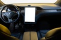 Lviv, Ukraine - October 17, 2022: Interior of Tesla Model X electric car with large touch screen dashboard, wheel