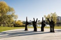 Lviv, Ukraine - October 09, 2022: Metal sculpture of four hands. Looking at their gestures read the letters LVIV