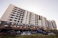 Lviv, Ukraine - October 09, 2022: Multi-storey, residential new home and car parking Royalty Free Stock Photo