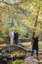 Lviv, Ukraine - October 24, 2019: older seniors people walking by autumn public park