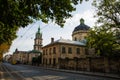 Lviv, Ukraine: Panorama of Pidvalna street with the tall bell tower of Dormition church and the dome of Dominican Church