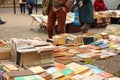 Lviv, Ukraine - 26.09.2021: people buying books in market outside. Old books on a flea market books. Colorful old second