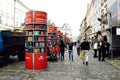 Columns with illustrations of book shelves with many books on them - a mobile electronic library