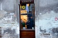 Lviv, Ukraine - September 30, 2016: Date in a cafe. Two people talking at a table in a cafe, view from the street Royalty Free Stock Photo