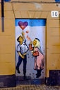 Lviv, Ukraine - September 20, 2016:Graffiti for couples in love to the house door.. Girl with a guy and airy red heart. Royalty Free Stock Photo