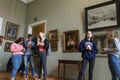 Lviv, Ukraine - September 16, 2018: A group of teenagers on an excursions of Art Gallery